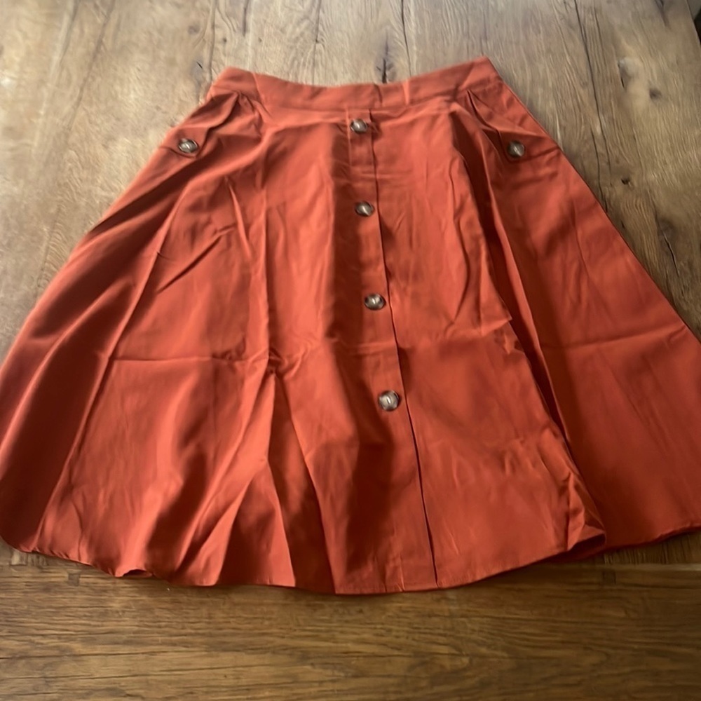 Sason Orange skirt with buttons